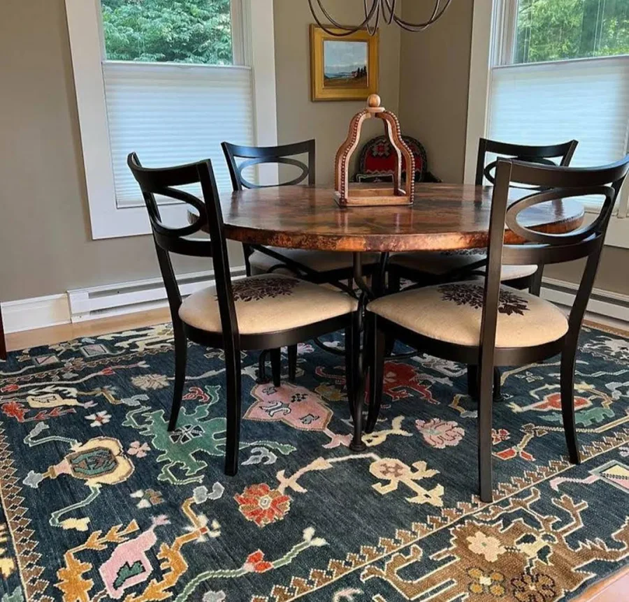Tabriz medallion rug in a dining room
